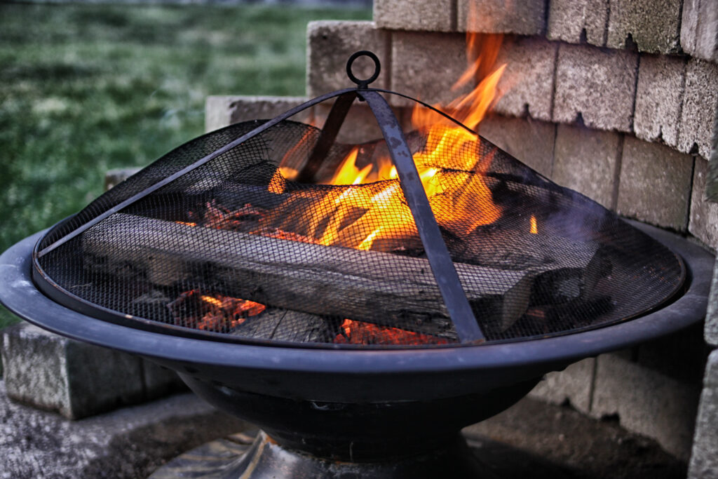 Picture of an outdoor fire pit with fire burning
