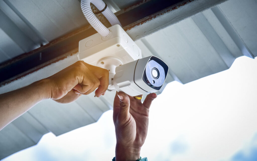 Picture of a technician installing a CCTV camera