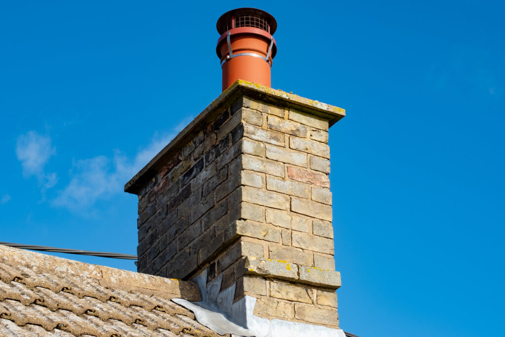 Picture of a chimney stack with blue sky in the backdrop