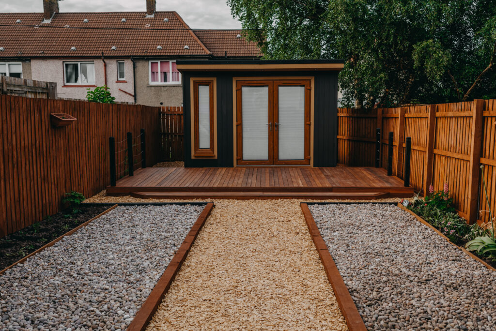 Picture of a summer house on a deck in garden