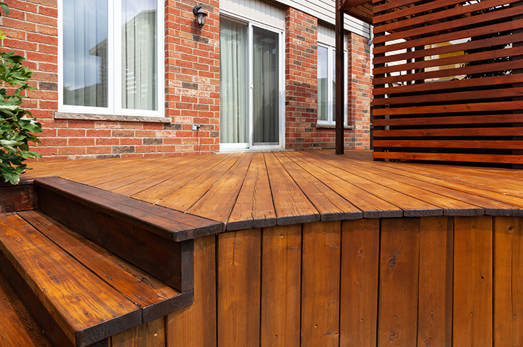 Picture of a wooden garden deck with wooden staircase