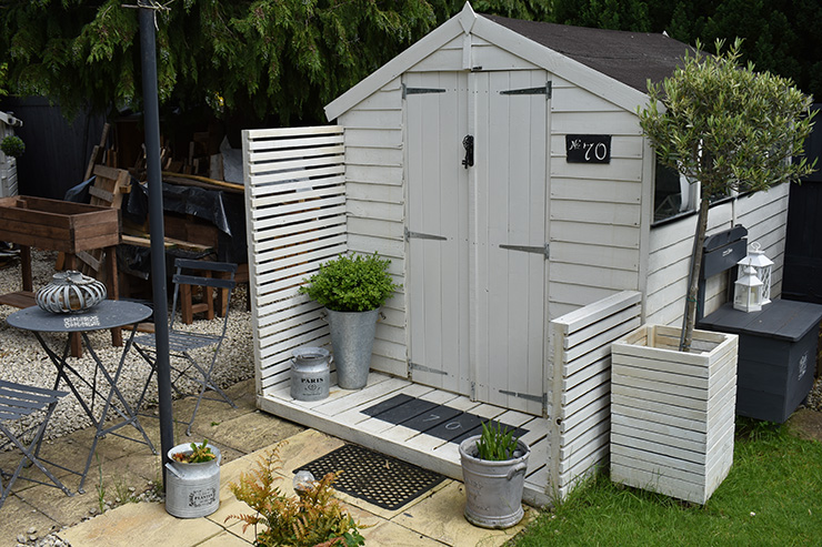 Picture of a garden shed painted white