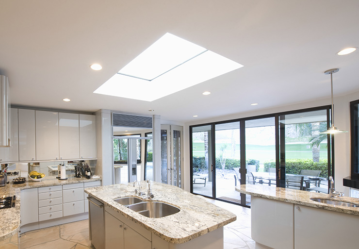 Picture of a kitchen with a central skylight