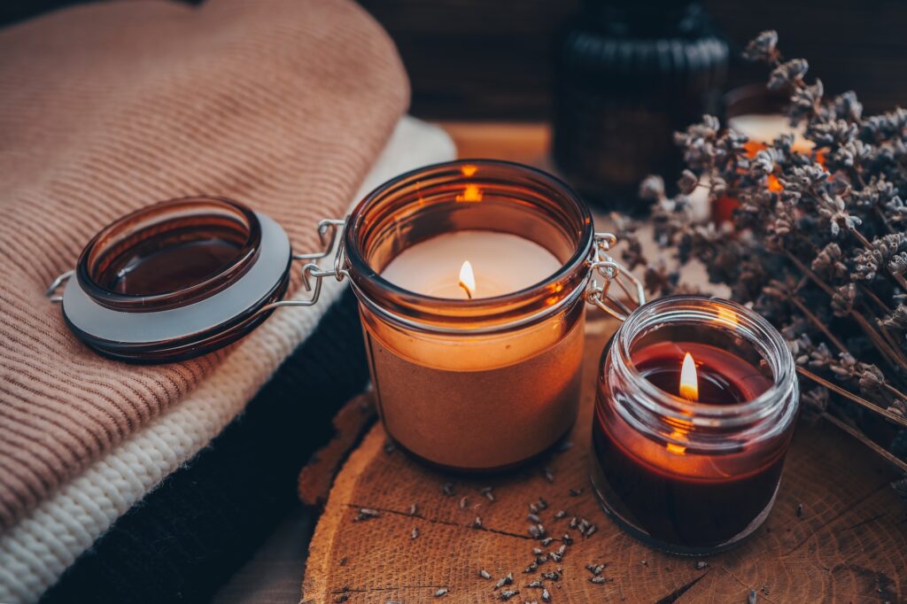 Picture of lit candles with book